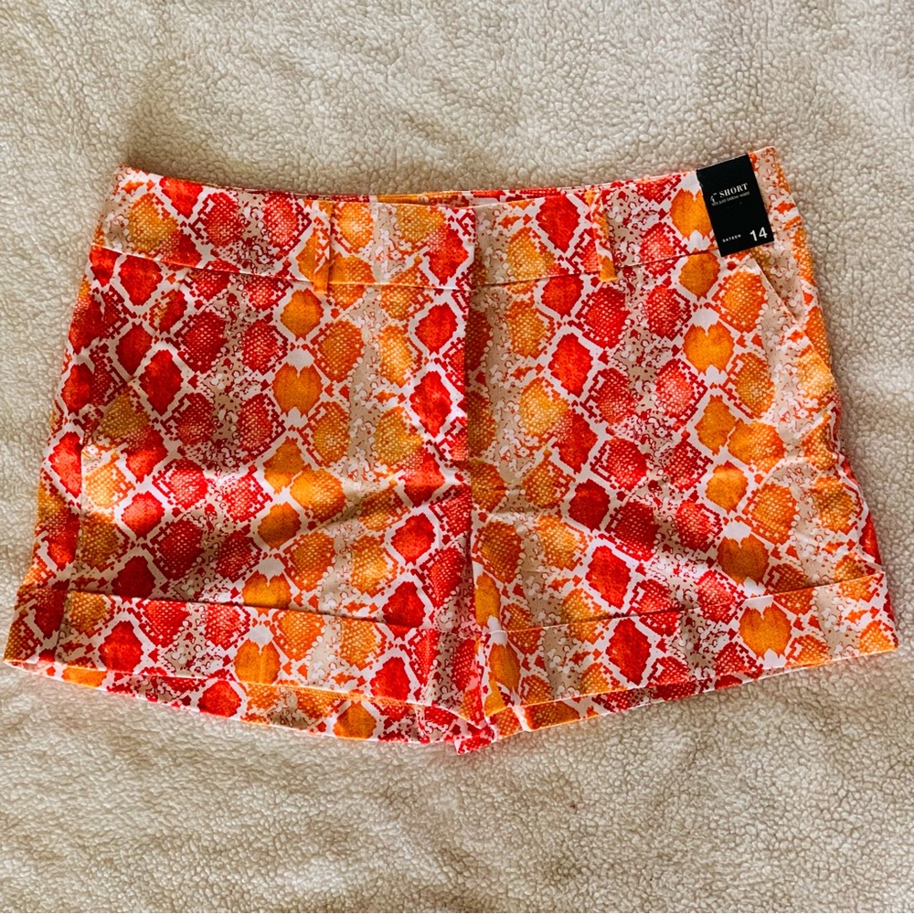 New York & Company orange snake skin shorts.
